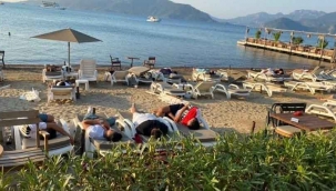 Uyarıları dikkate almayan turistler sahilde uyumak zorunda kaldılar