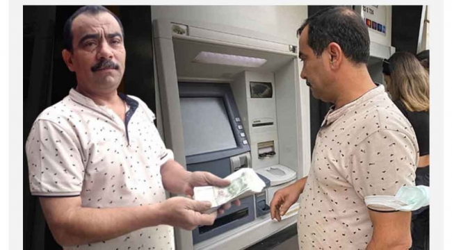 ATM de unutulan 10 bin TL' yi bankaya teslim etti